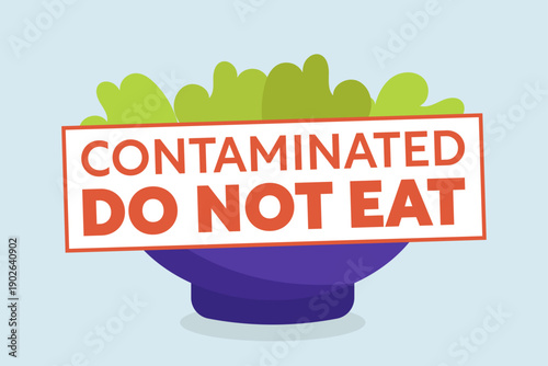 Contaminated, do not eat. Contaminated food warning sign with text over a bowl of salad.