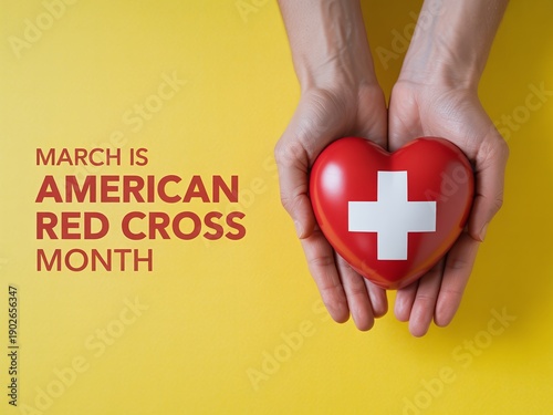 March is American Red Cross Month Announcement with Adult Hands Holding a Red Heart Symbol for Nonprofit Charity and Blood Donation Drive
