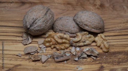 A composition of typically autumnal fruits such as walnuts and chestnuts enhancing their beauty and detail.