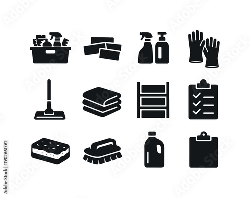 Home Cleaning Icons. Home Cleaning Station. Solid icon set of Home Cleaning Station: organized supplies bin, label stickers, spray bottles, gloves, mop,
