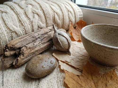 Autumn Still Life: Knitted Wool, Weathered Driftwood, and Natural Textures