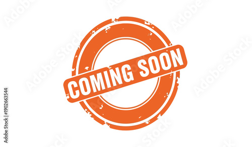 A bright orange coming soon stamp on a with a distressed texture