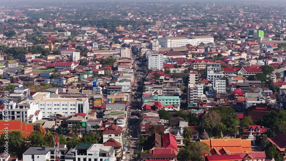 custom made wallpaper toronto digitalHigh angle panorama of Vientiane, Laos, featuring rooftops, urban development, and construction cranes of the stadium in city center
