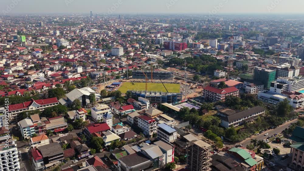 custom made wallpaper toronto digitalUrban landscape of Vientiane, Laos, featuring Mekong River embankment bordering with Thailand and city skyline on hazy sunny day