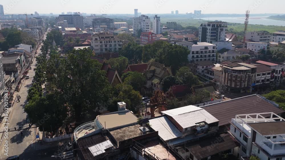 custom made wallpaper toronto digitalUrban landscape of Vientiane, Laos, featuring Mekong River bordering with Thailand and modern architecture under a clear sky during daytime