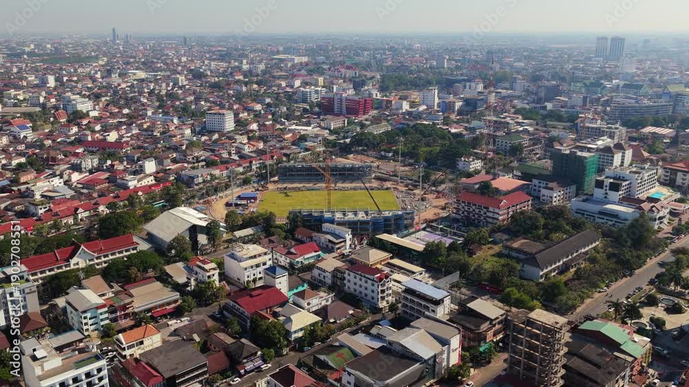 custom made wallpaper toronto digitalHigh angle fixed shot of urban development, residential architecture and car traffic in Vientiane, Laos with moving traffic
