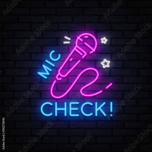 Karaoke. A neon mic with stars and text evokes the start of a show and soundcheck before the spotlight.