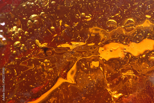 High resolution photo of a richly textured liquid cognac or whisky