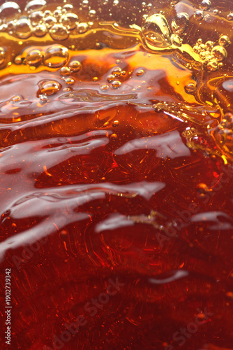 High resolution photo of a richly textured liquid cognac or whisky