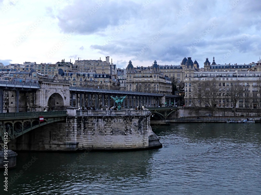 Obraz premium Paris, February 2026: Visit of the magnificent city of Paris, Capital of France - View on different facades of buildings built by Baron Haussmann