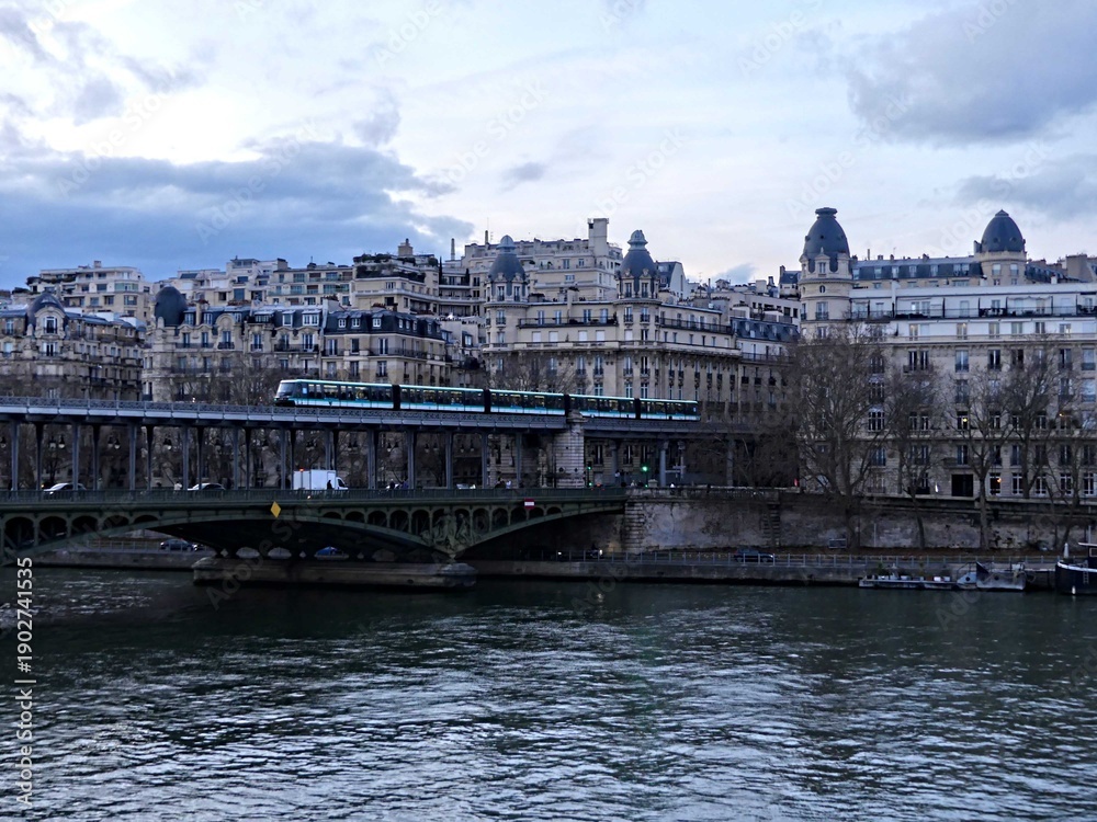 Obraz premium Paris, February 2026: Visit of the magnificent city of Paris, Capital of France - View on different facades of buildings built by Baron Haussmann