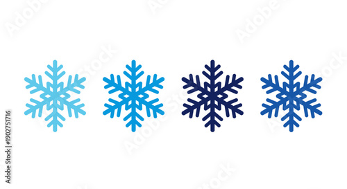 Snowflake Variations: Four distinct snowflakes in varying shades of blue, arranged in a row, offer a serene depiction of winter's gentle beauty.