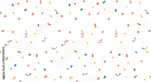 Confetti and streamers scattered across a white background, festive, abstract, and colorful.