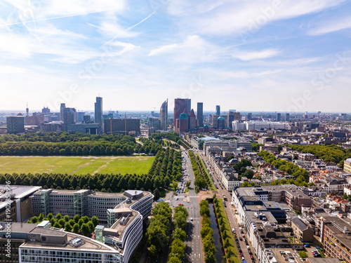 Schilderij op canvas The Hague cityscape with modern and historical buildings, green areas, roads wit