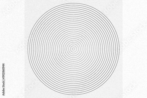 A lot black circles into each other leaving in a distance equal to the thickness of all lines.