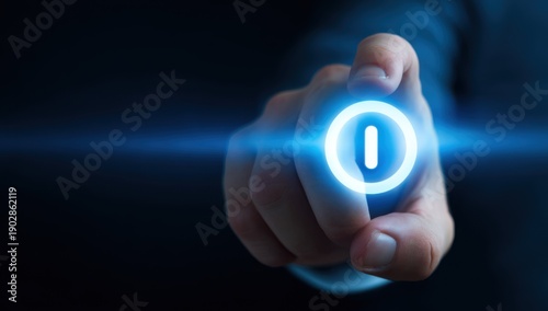 Hand pressing glowing blue power button icon on dark background, representing tech activation, startup and digital control concept