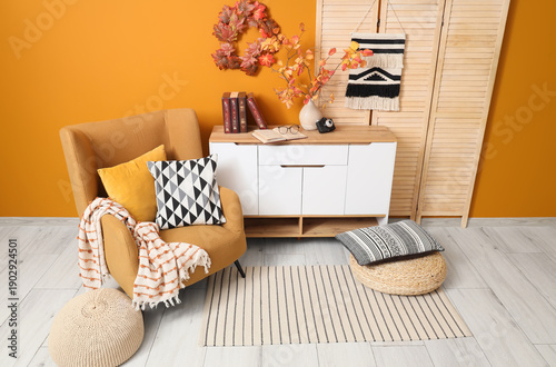 Comfortable armchair, poufs...