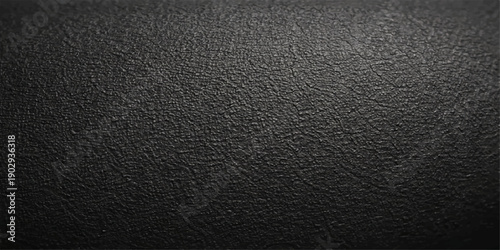A dark black leather texture with a macro grain pattern creates a rough vintage material surface and a natural fabric backdrop for a textured grey wallpaper design
