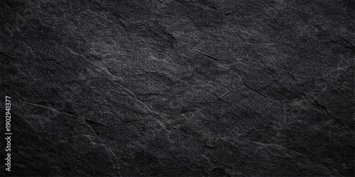 Rough black and white leather texture on a dark grunge fabric surface creates an old textured paper wallpaper pattern with a macro gray textile material backdrop and a blank rough canvas wall design
