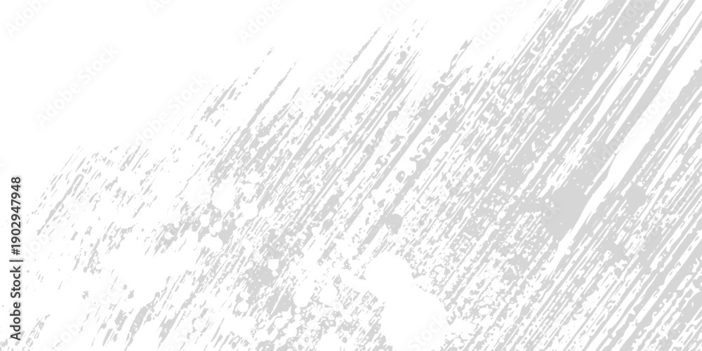 Fototapeta premium Abstract background with diagonal gray brush strokes and scattered dark particles on a white surface.