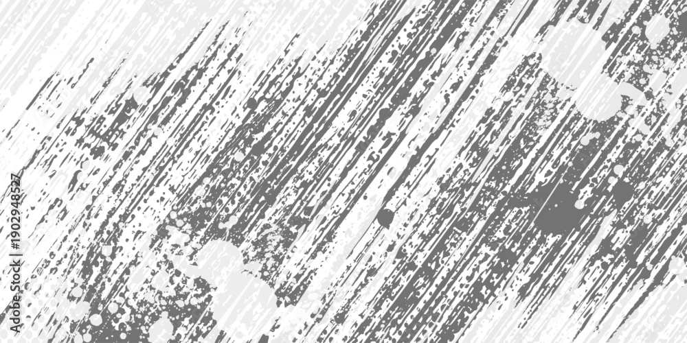 Fototapeta premium Abstract background with diagonal gray brush strokes and scattered dark particles on a white surface.