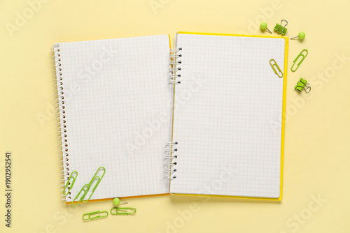 Blank open notebooks, paper...