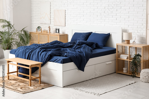 Interior of light bedroom w...