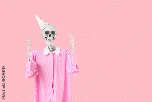 Human skeleton in party hat...