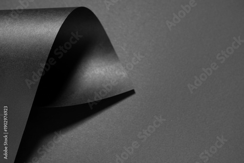 Black paper on dark backgro...