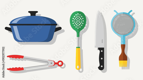 Kitchen utensils and cookware arranged on a clean surface, viewed from directly above, showcasing a variety of cooking tools and equipment