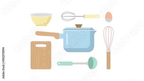 Kitchen utensils and cookware arranged neatly on a clean white surface from a top-down viewpoint