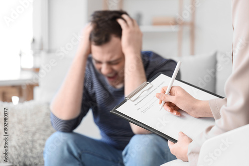 Female psychologist with dr...