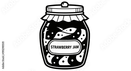 A jar filled with homemade strawberry jam on a kitchen countertop.