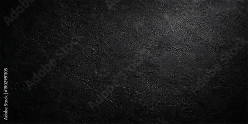 A dark grunge texture featuring a black and white rough pattern on an old canvas material surface for a dark grey textured wall backdrop