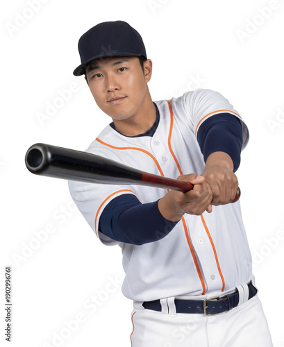 Asian baseball player in white uniform posing while swinging a bat