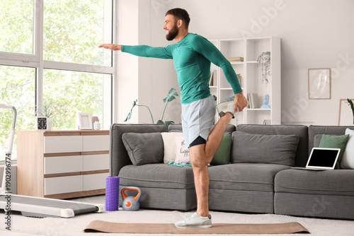 Sporty young man exercising...