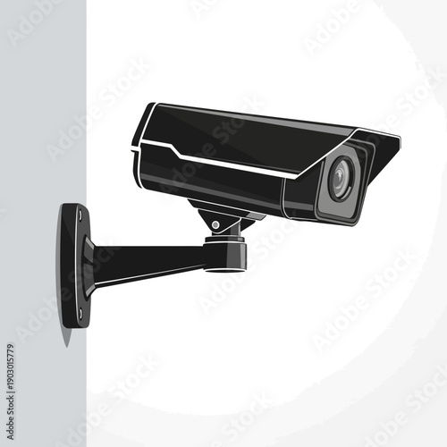A black security camera is mounted on a white wall, angled slightly downwards.