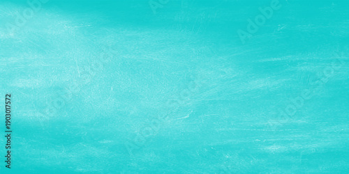 An abstract blue grunge background features a textured turquoise surface with vintage paper patterns and light paint strokes, evoking the clear design of old sea water or a swimming pool wall