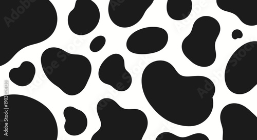 A seamless pattern of black and white cow spots, perfect for backgrounds and textures.