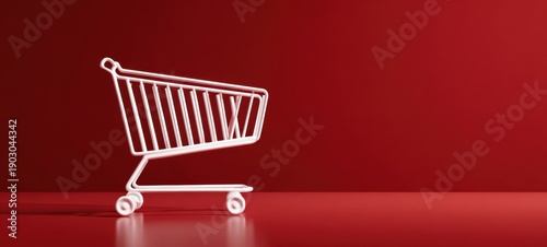 The shopping cart on a glossy red background for minimal retail and marketing concept