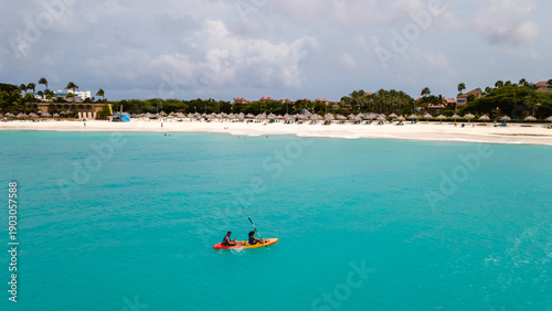 Schilderij op canvas Kayaking adventure in the serene waters of Divi Beach, Oranjestad Aruba during a