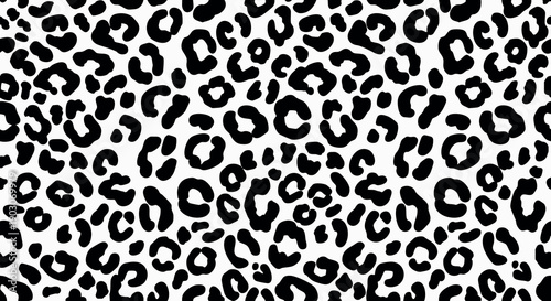 Seamless black and white leopard print pattern fills the frame