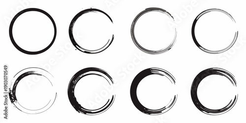 A collection of eight black and white circular brush stroke designs