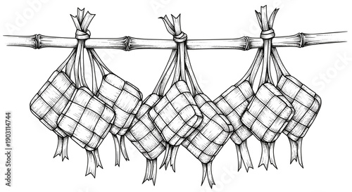 Bags of dried herbs hanging on rope.
