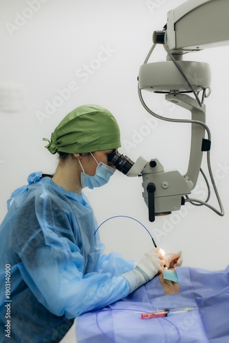 Tableau sur toile Surgeon performing eye microsurgery using advanced medical technology