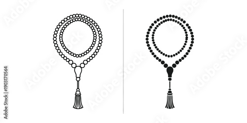 Tasselled prayer beads in black and white on white background