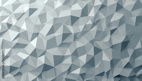 A modern geometric pattern of gray and white polygons creating a textured background