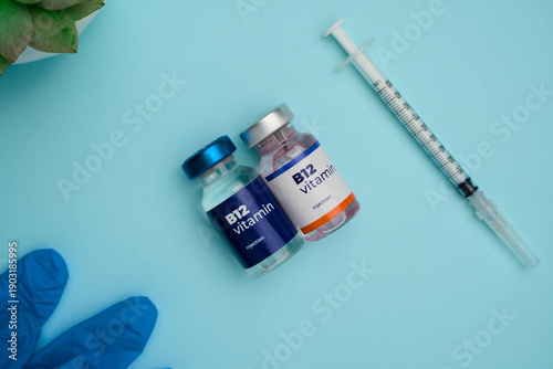 B12 vitamin injection vials and syringe ready for medical treatment