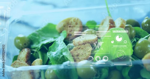 Upon first frame, HUD panels appearing over packaged green salad sliding and showing product data