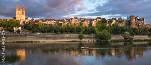 Billede på lærred Sunset scenery in beautiful city of Angers in France, with famous chateau and ca